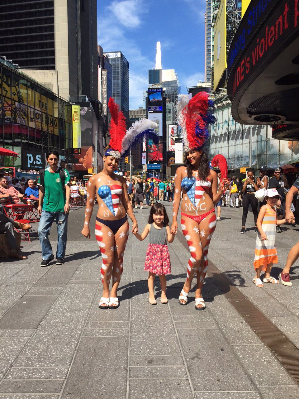 A Native New Yorker poses with the desnudas<br>